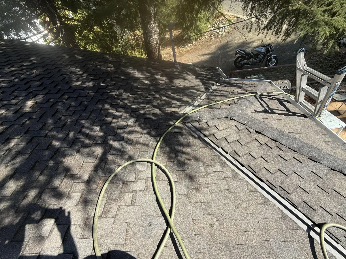 Clean residential gutter preventing water damage roof edge Solano County professional gutter cleaning service