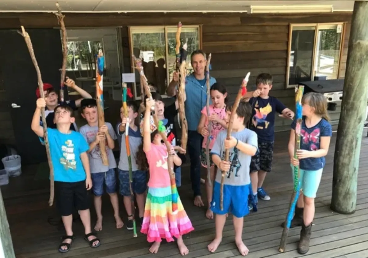 Teacher helping kids learn