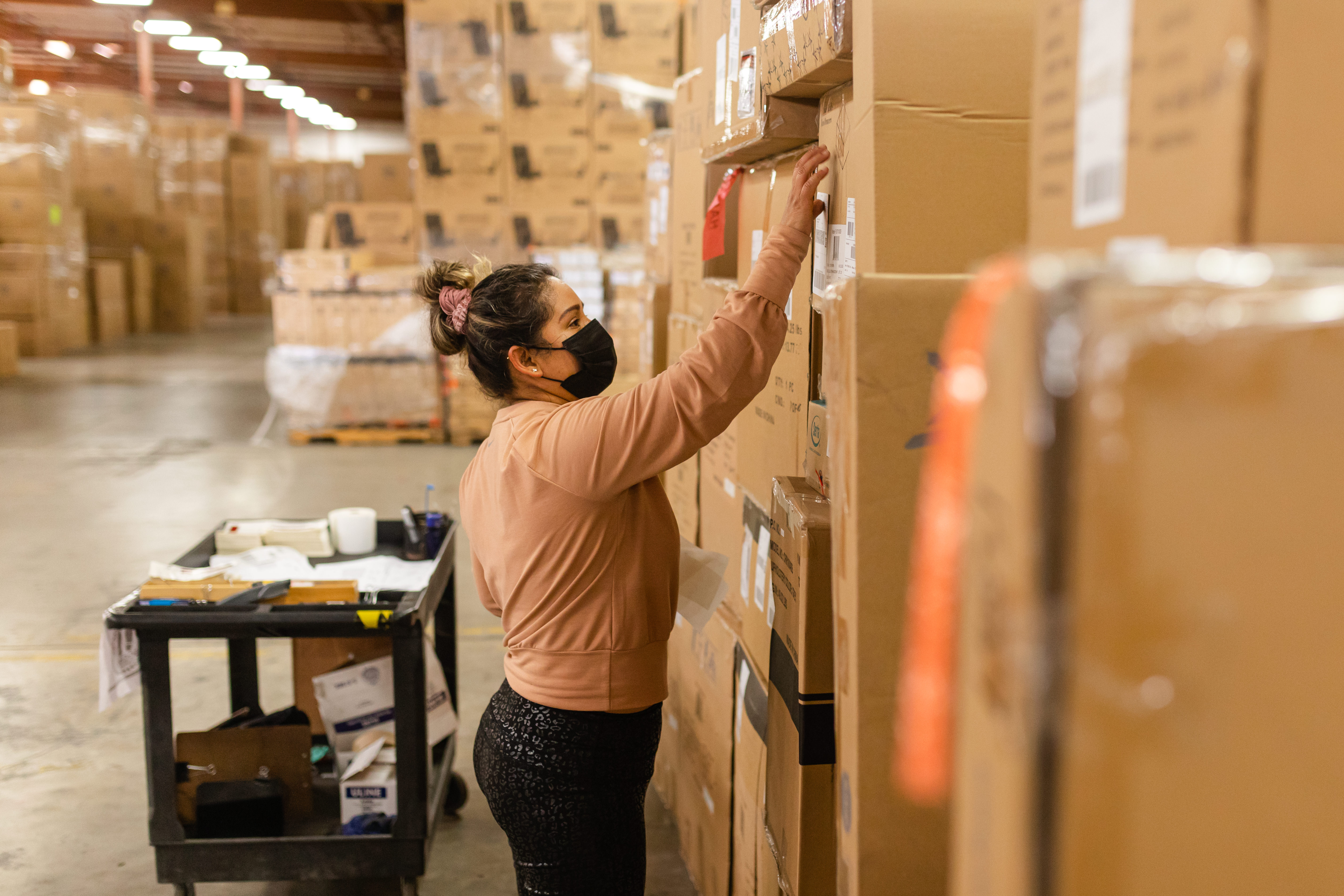 GSW 3PL warehouse associate picking eCommerce orders from shelving — accurate and fast order fulfillment