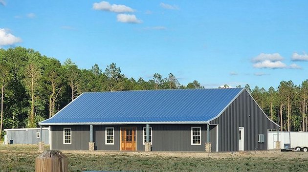 Modern agricultural metal barn by So Cal Metal Buildings