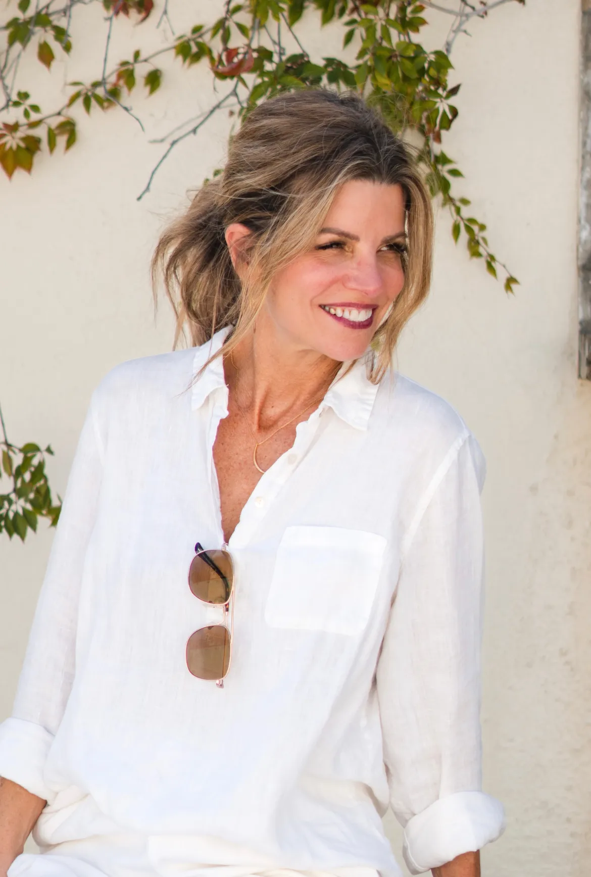 Mindi Huebner - white shirt smiling