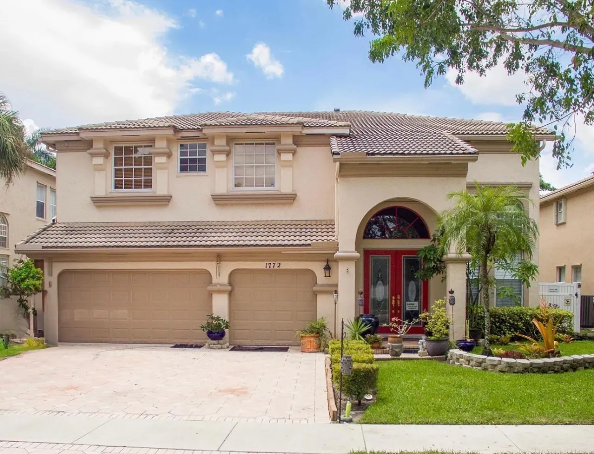 a living room filled with furniture and a fire place