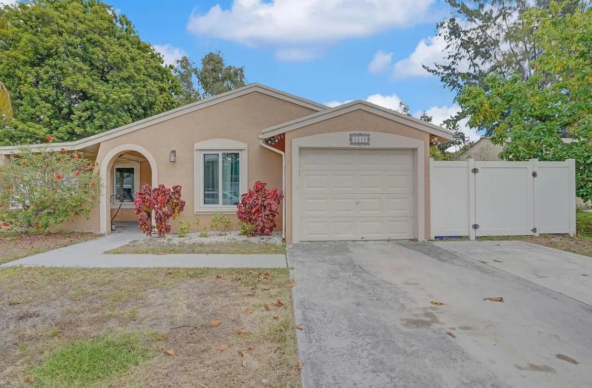 a living room filled with furniture and a fire place