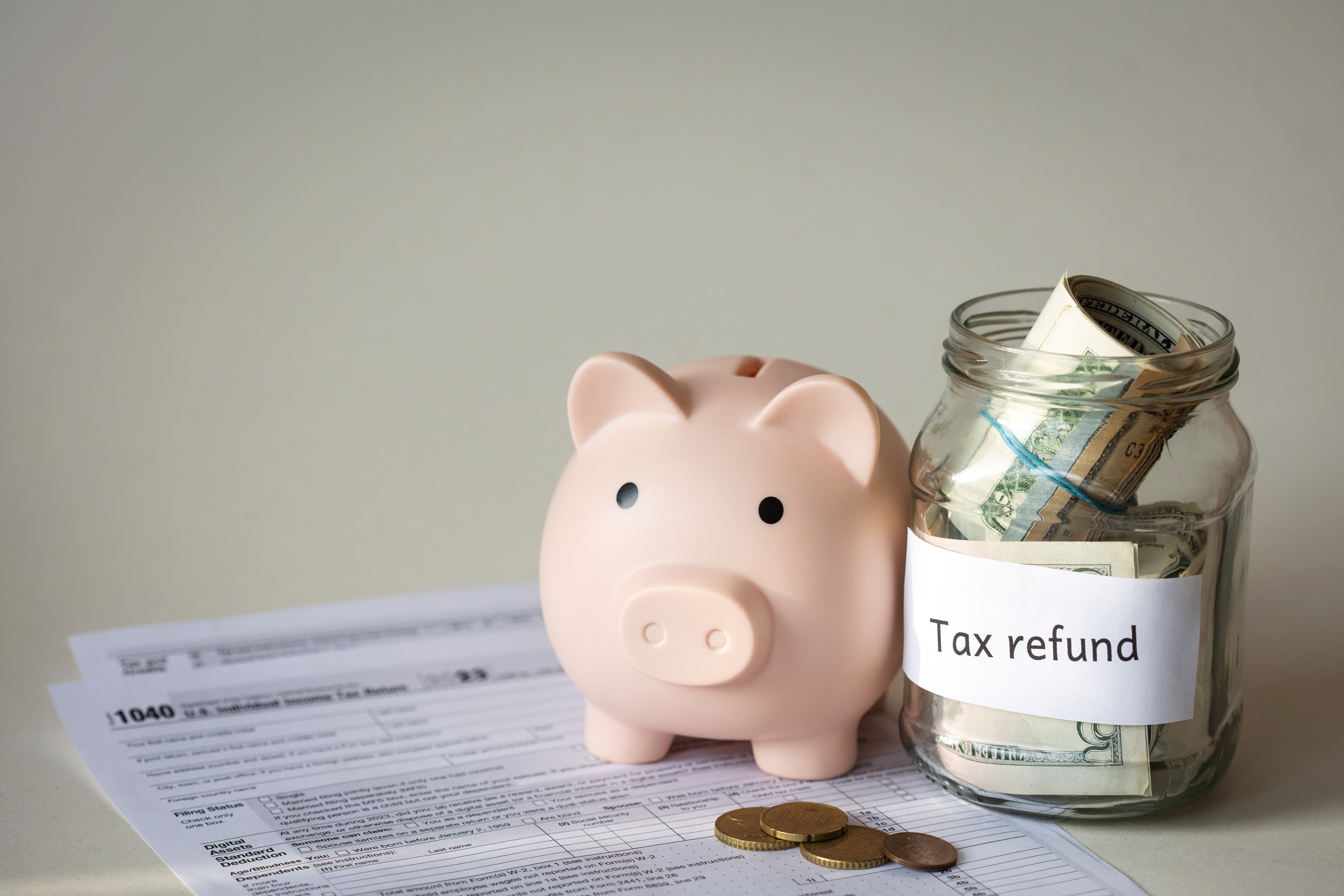 a sign that says pay your tax now here