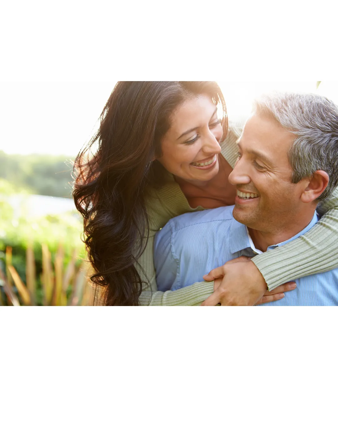 woman leaning over a mans shoulder