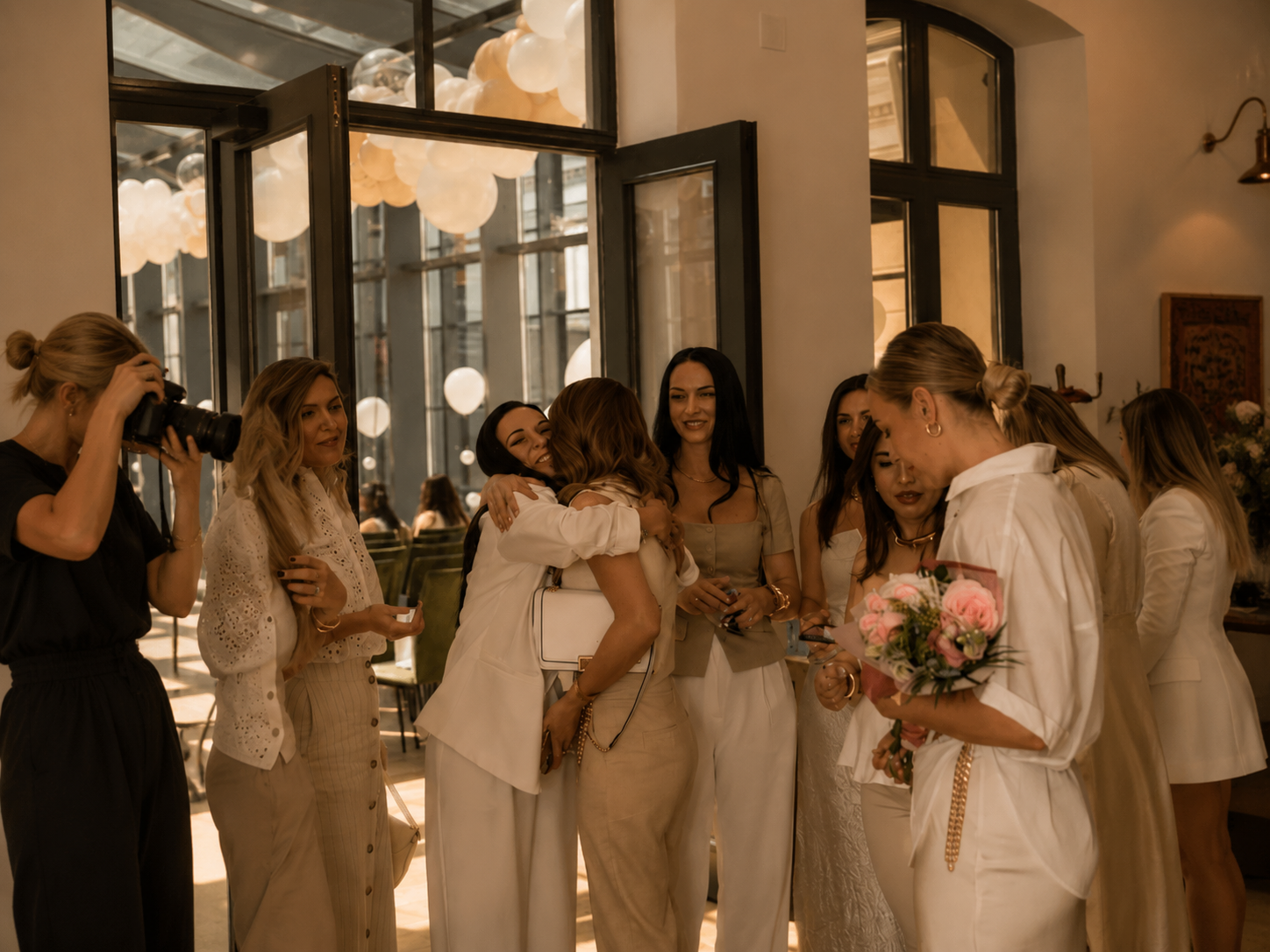 Women embracing at a Her Table gathering
