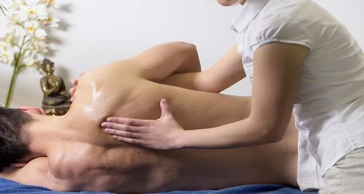 Athlete receiving sports massage therapy at K Spa in Bellevue