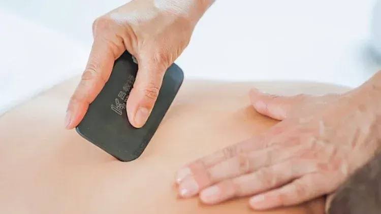 Traditional gua sha treatment combined with modern massage at K Spa