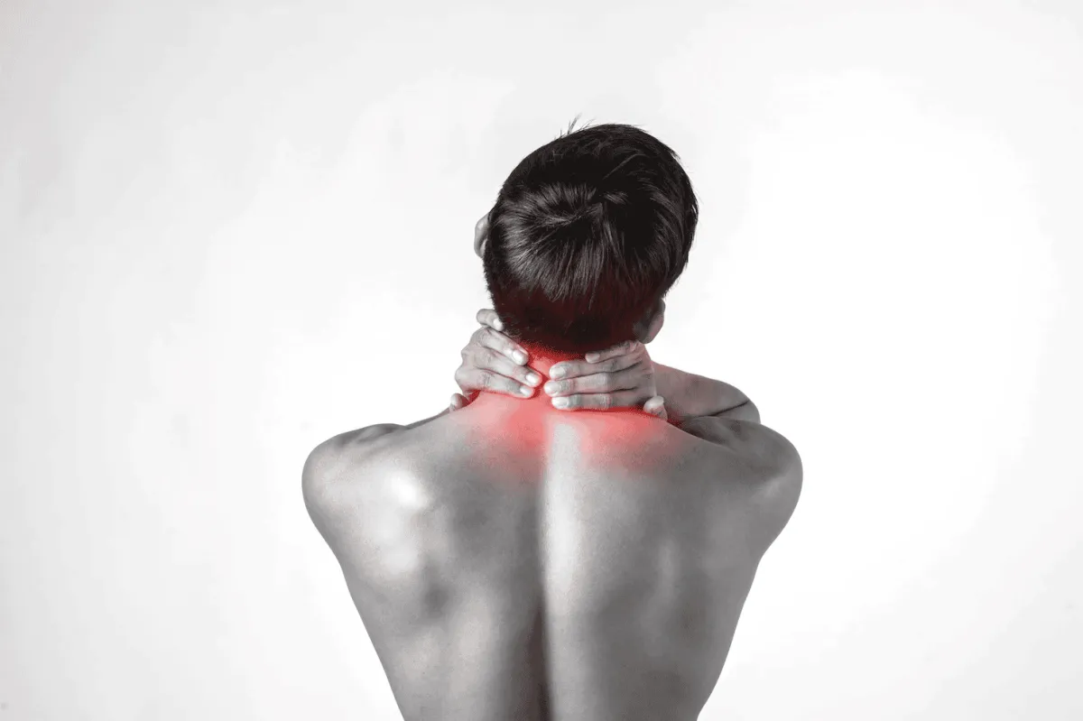 Client receiving targeted massage for muscle knots and tension release