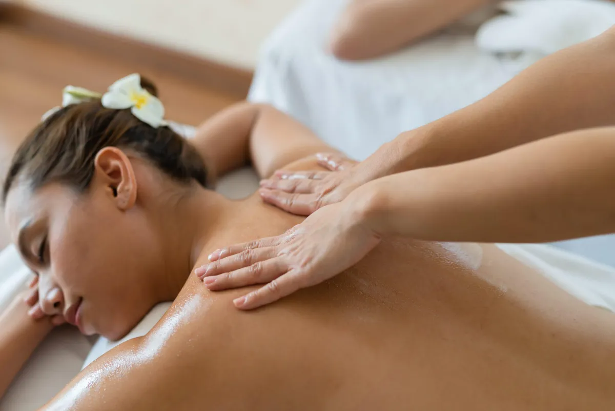 Massage session focused on relieving upper back tension and knots