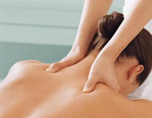 Massage room setup at K Spa for targeted back and shoulder therapy