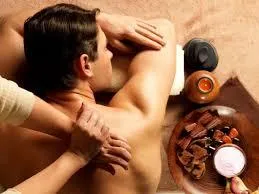 Serene room setup for head, neck, and shoulder massage