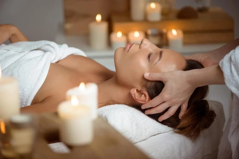 Client enjoying relaxing aromatherapy massage