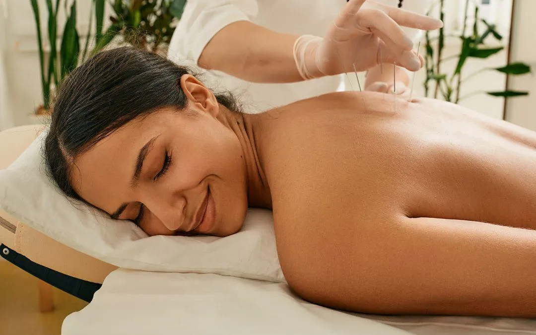 Therapist performing gentle strokes for relaxation