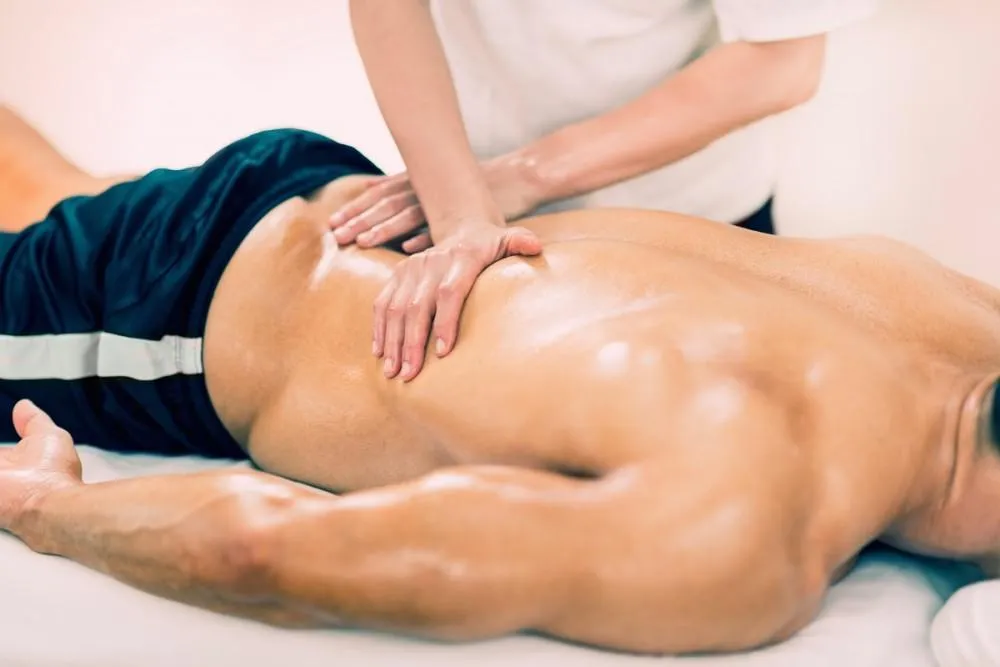 Massage therapist treating sciatica at K Spa Bellevue