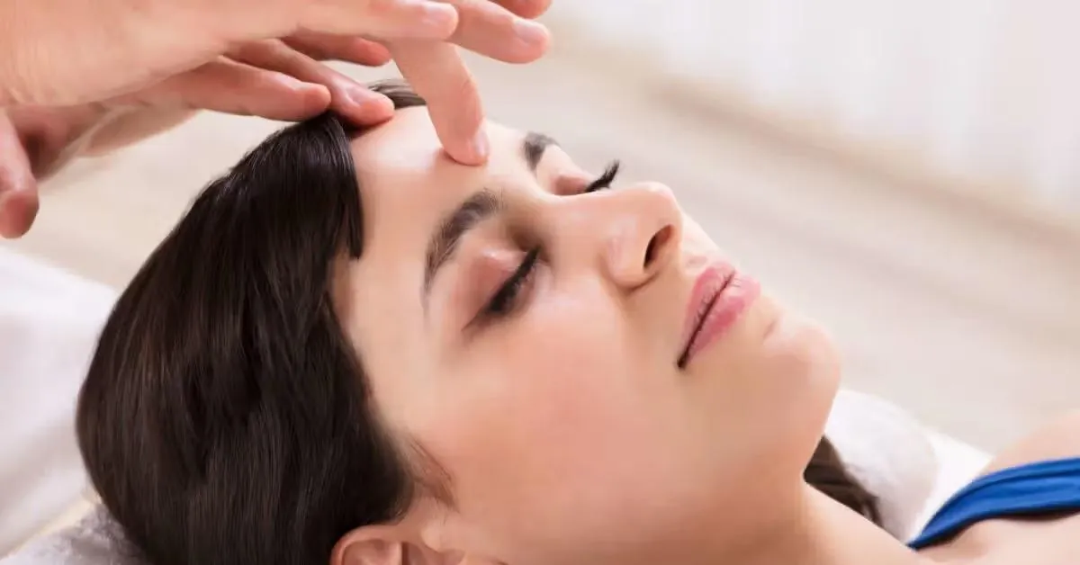Bellevue massage therapist treating tension-related headache