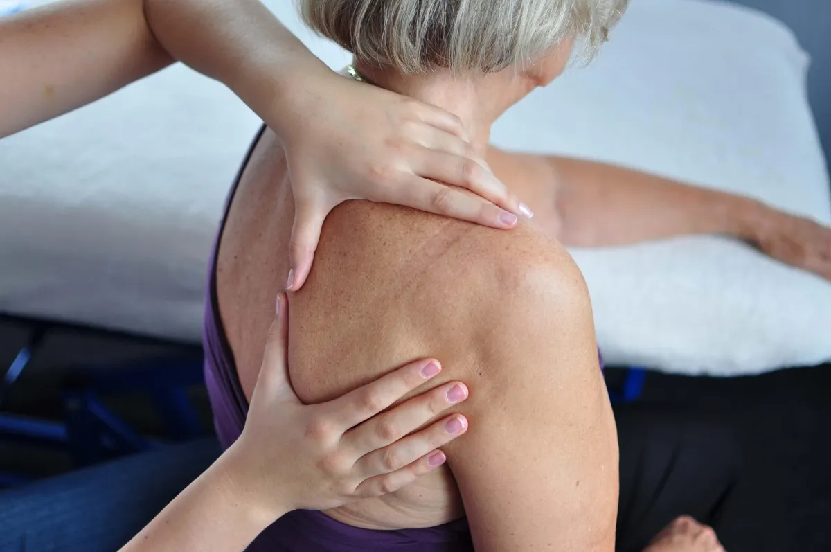 Client receiving shoulder mobilization at K Spa