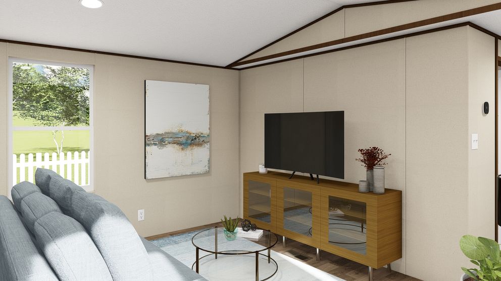 a river running through a lush green park next to tall buildings