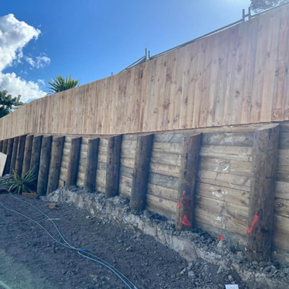 Retaining wall built for Auckland property with new fencing
