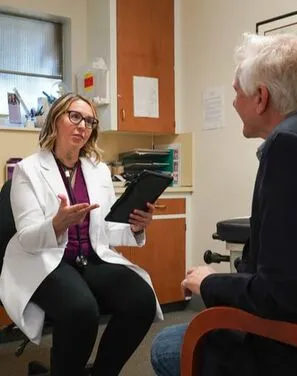 Dr. Hamill consulting with patient
