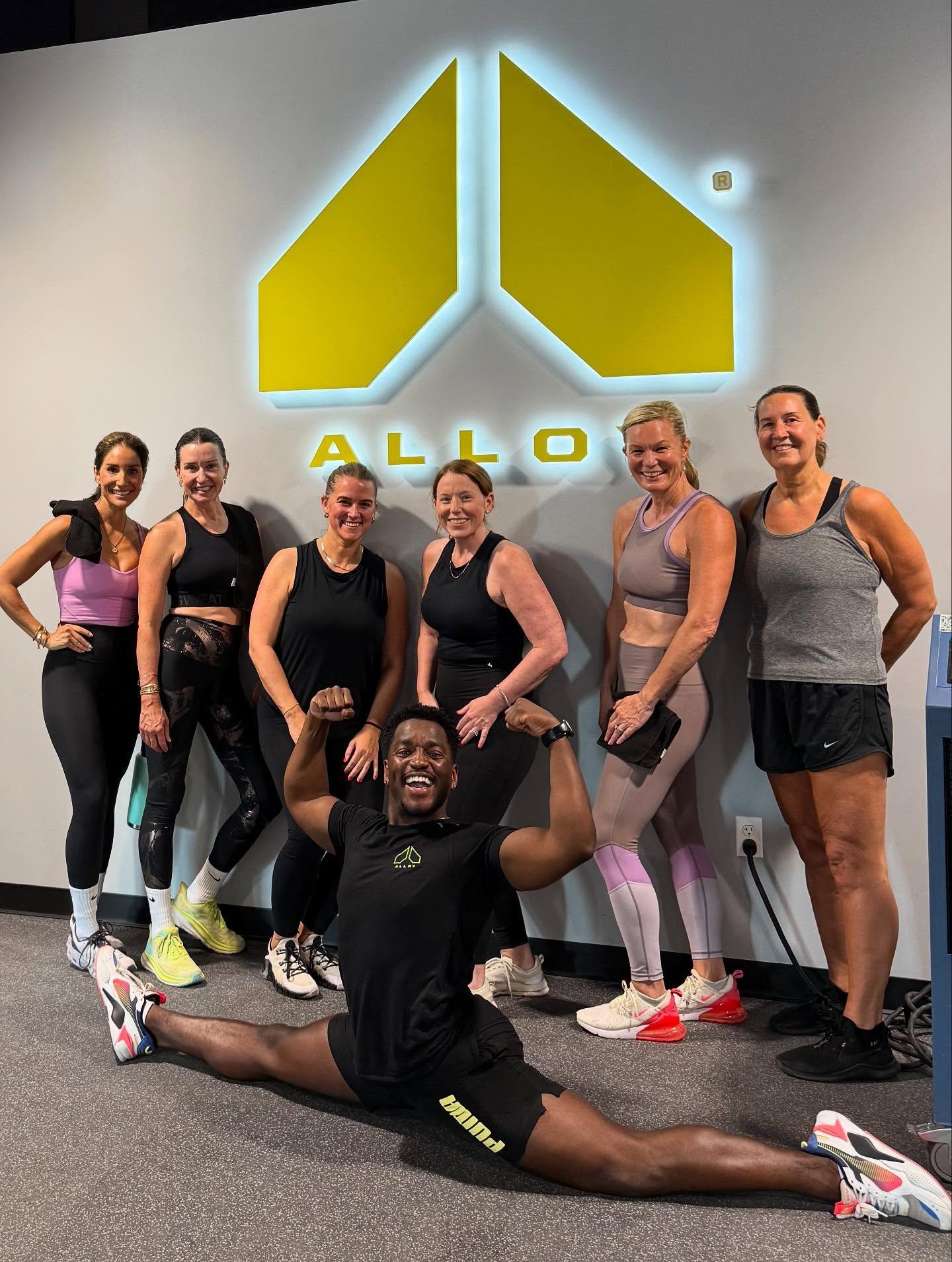 Small group personal training group after a functional strength and mobility exercise for adults over 35 in Chicago