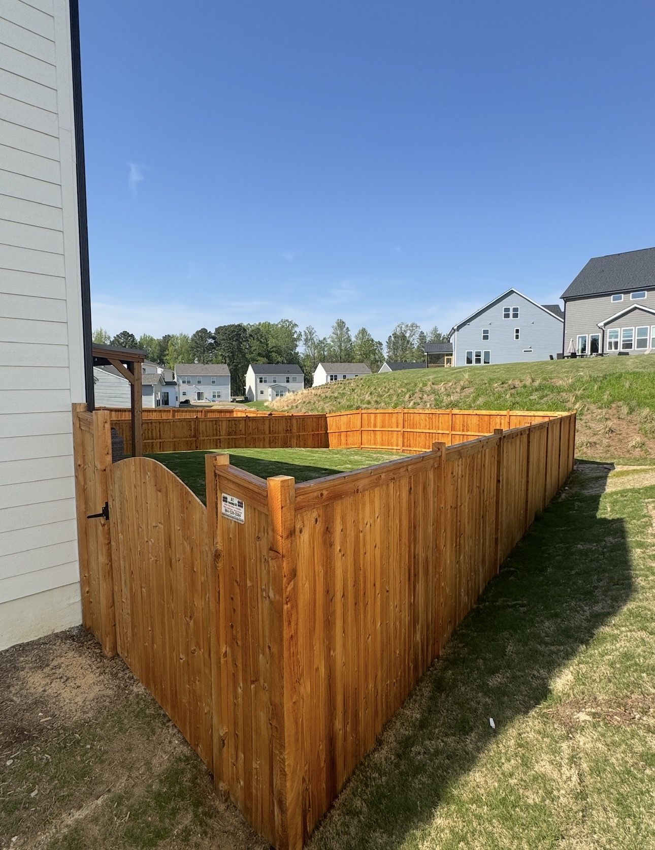 Professional wood fence staining service in Raleigh, NC