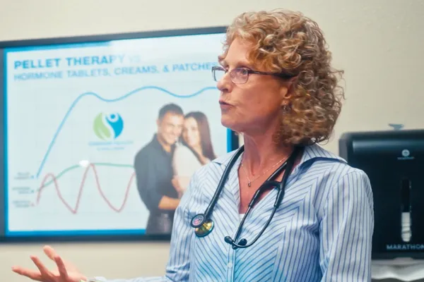 Dr. Howe discusses peptides with a patient in Grand Junction