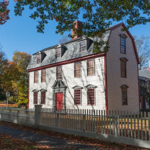 picture of an old farm house on land