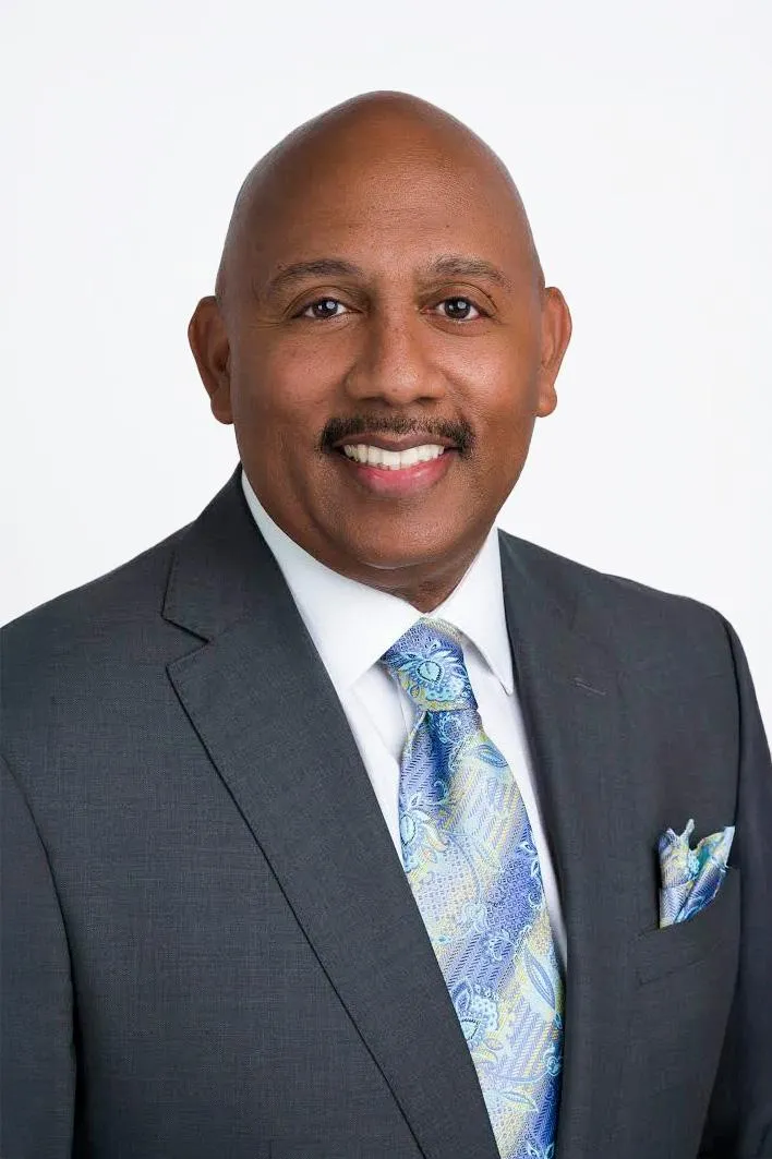 Black male smiling during headshot session in Tampa