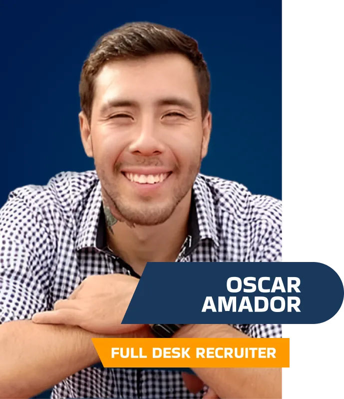 portrait of oscar amador with a blue background, a smiling man wearing a plaid shirt,  senior recruiter at construction recruitment solutions