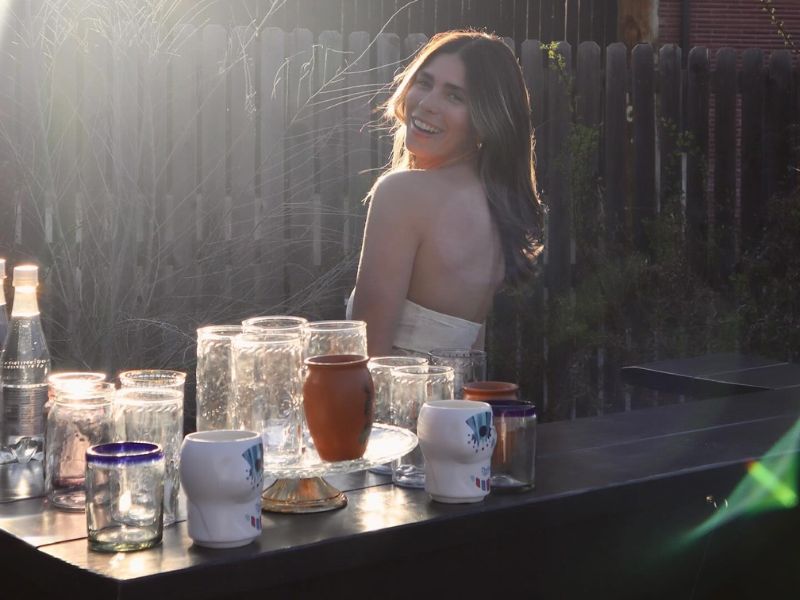 Outdoor cocktail bar setup in Denver with drinks and garnishes prepared for mobile bar catering service