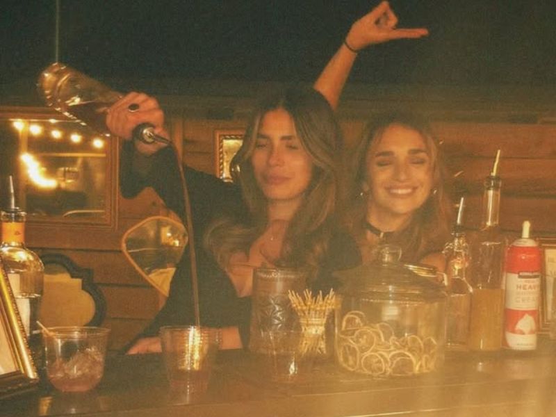 Friends enjoying cocktails at an event with Bad Rabbit Caravan’s Denver coffee and bar catering service