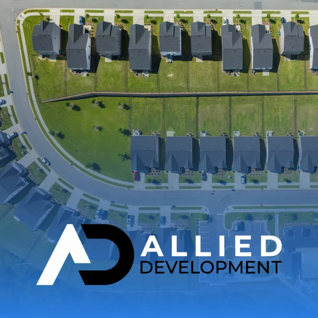 Allied Development Logo with Real Estate Development In Background