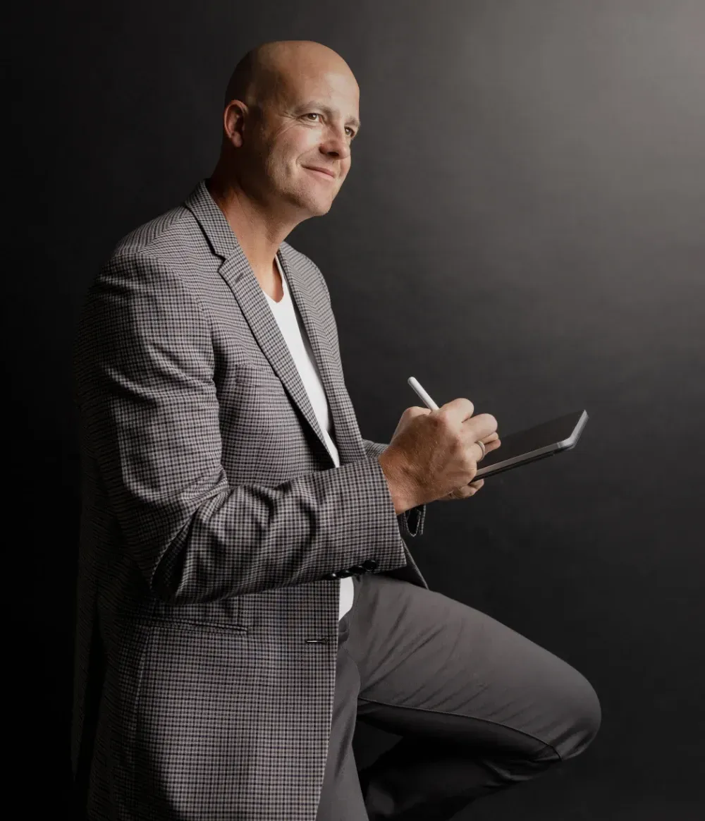 Cody Bjugan making plans on tablet