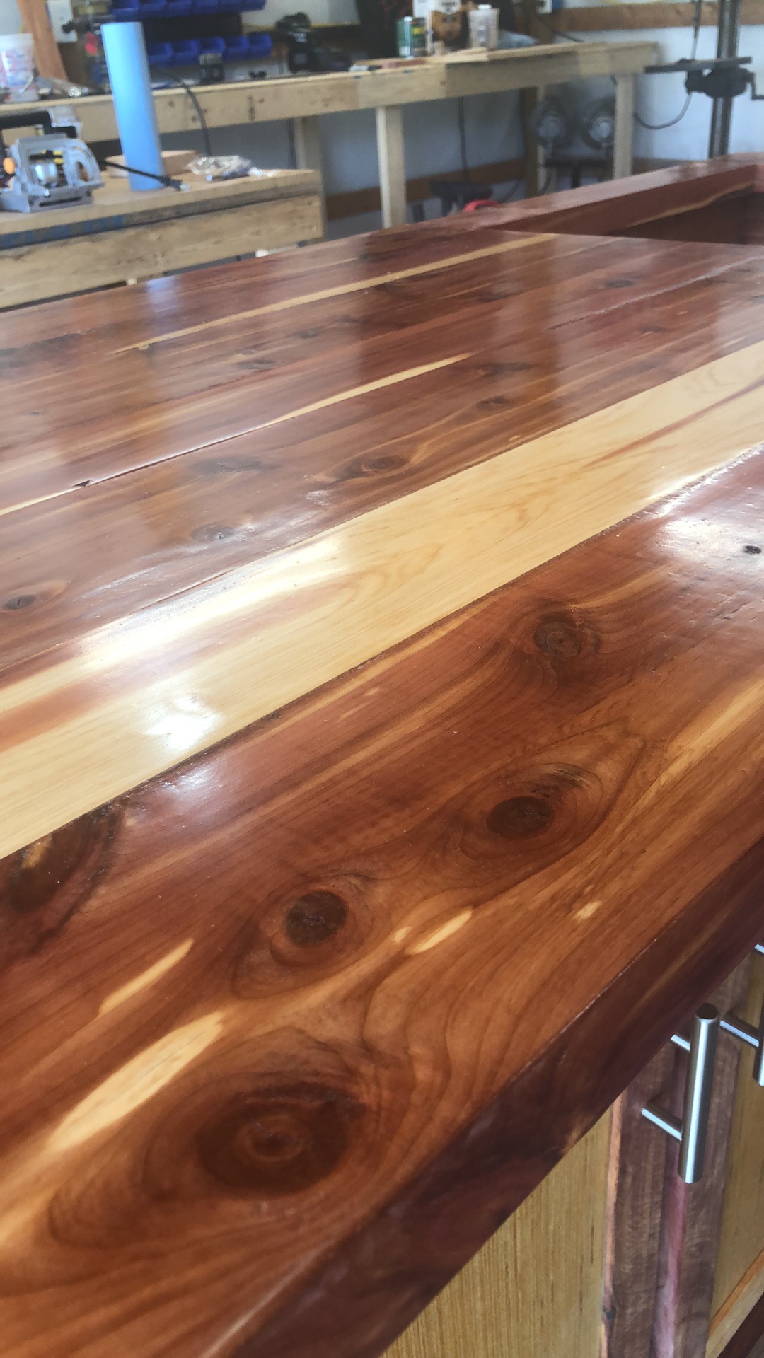 Wood-finished smart LED desk lamps with handcrafted details and touch controls, finished by Trevor to match wood furniture.