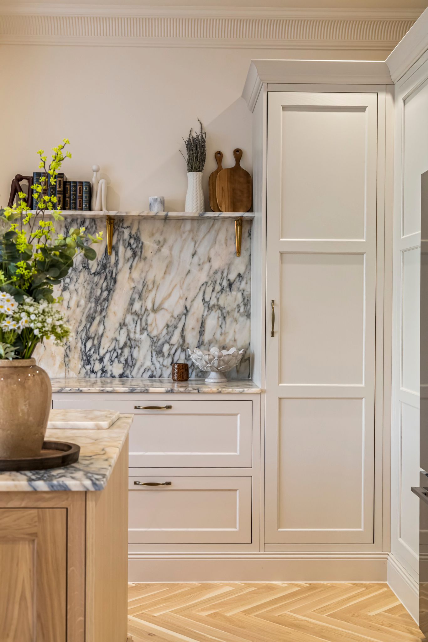 Bespoke cabinetry in Hove built into an alcove with cupboards and shelving