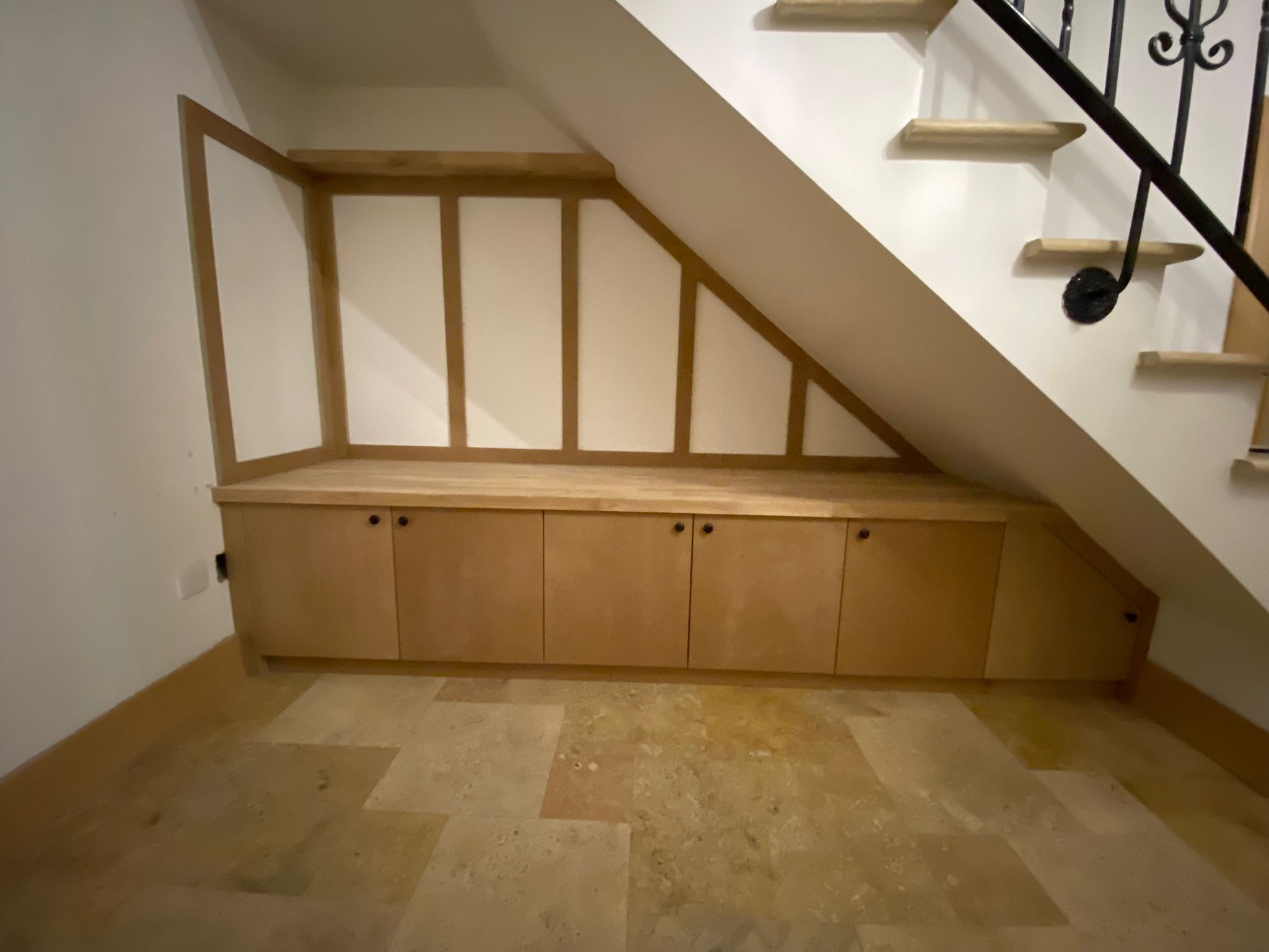 Custom carpentry in Hove built into an alcove beside a chimney breast