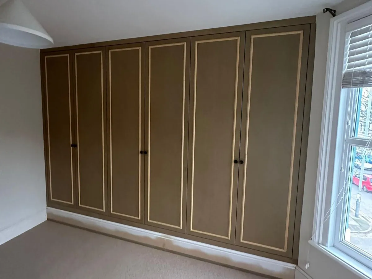 Fitted wardrobes in Hove built floor to ceiling in a bedroom
