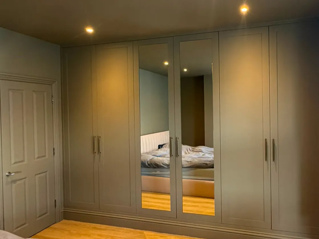 Walk in wardrobe installation in Hove with open hanging rails and shelving