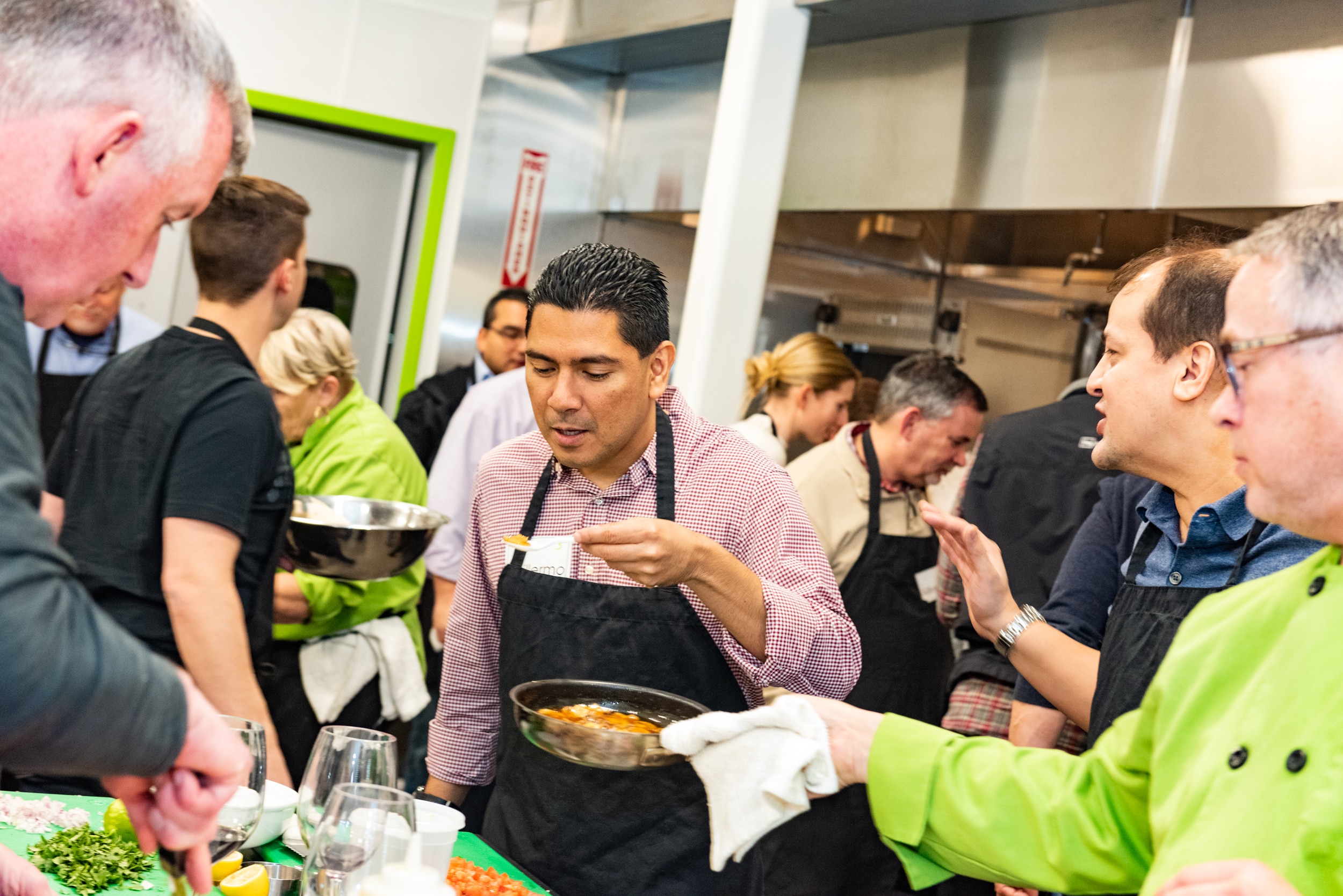 A cinematic high-energy culinary showdown in a premium corporate kitchen