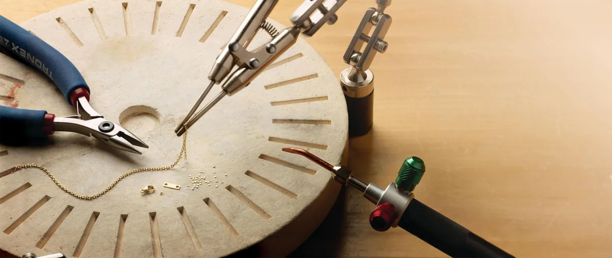 a close up of a purple flower with yellow stamen