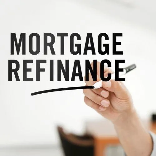 writing mortgage refinance on a glass window