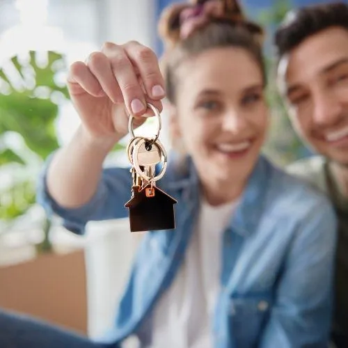 young couple getting a new home with an FHA loan