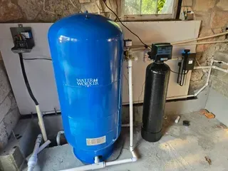 Well water pump and pressure tank with filtration system installation in Central Texas