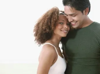 couple embracing and smiling