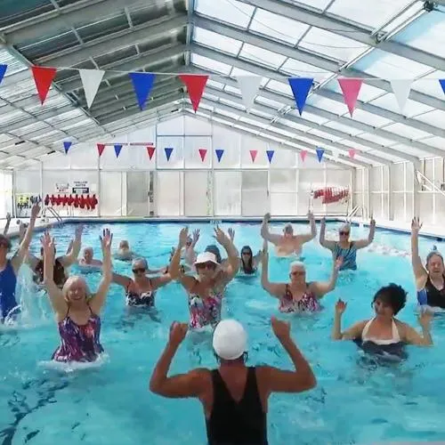 Group of seniors enjoying an aquatics class.