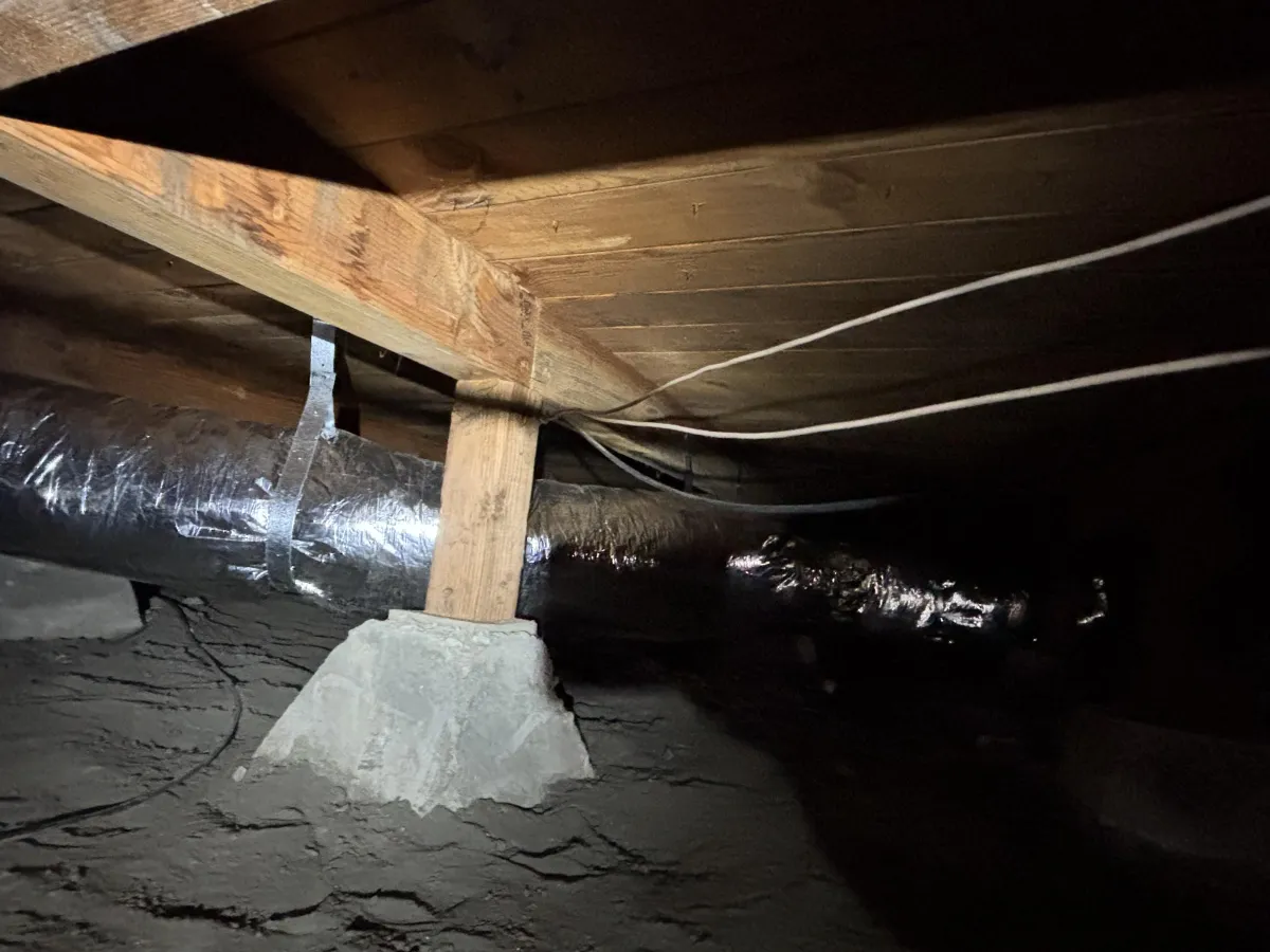 Certified Luna HVAC technician performing a residential AC system diagnostic and maintenance check in Marina, CA.