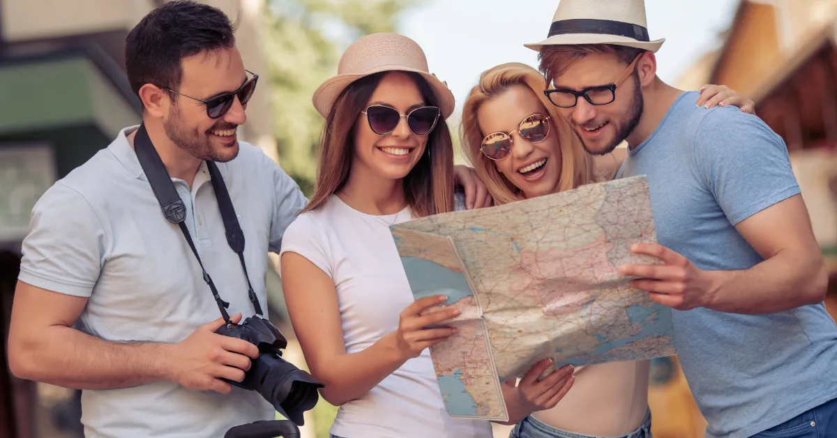 two person standing on gray tile paving