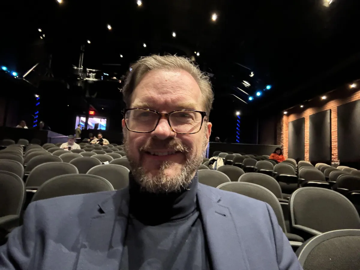 Richard leaning on scores