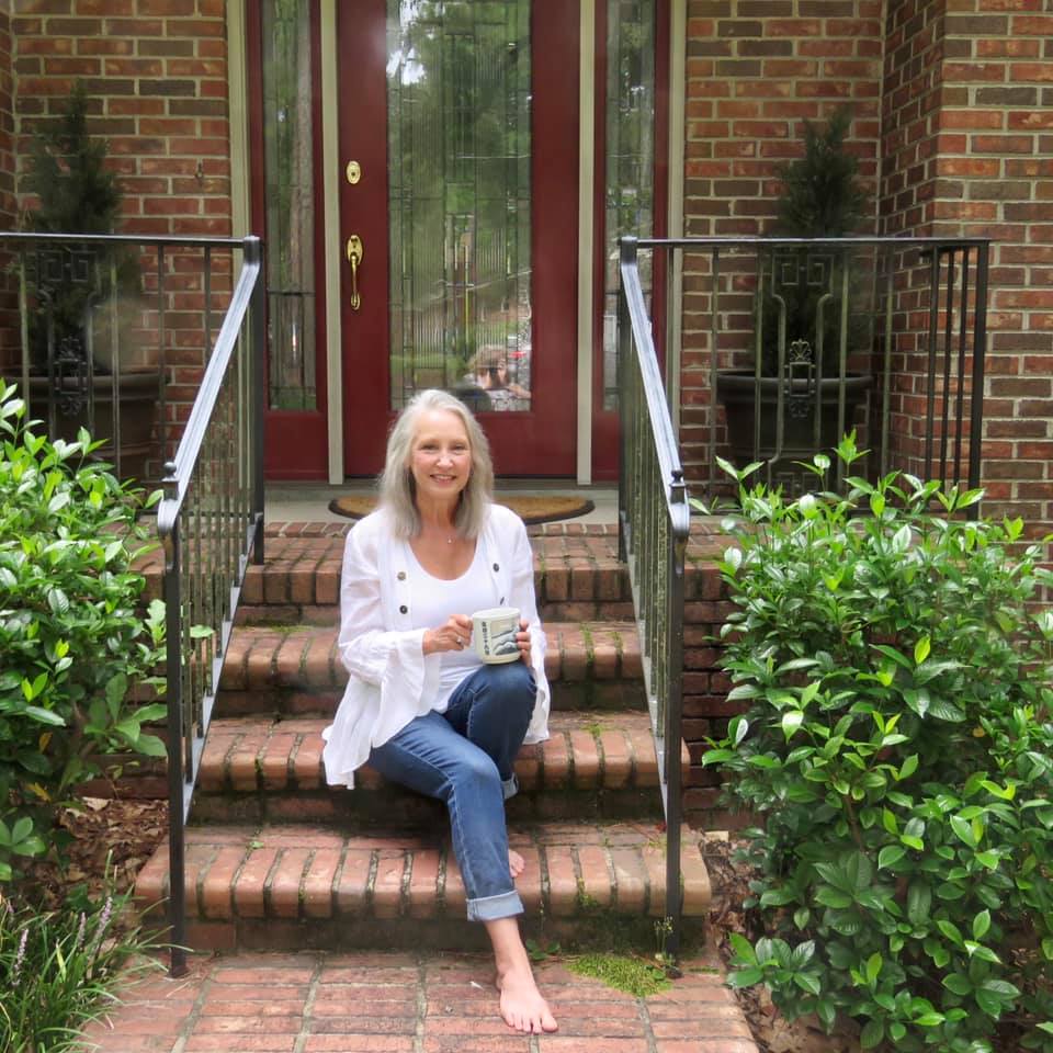 Anne Wade sitting on steps